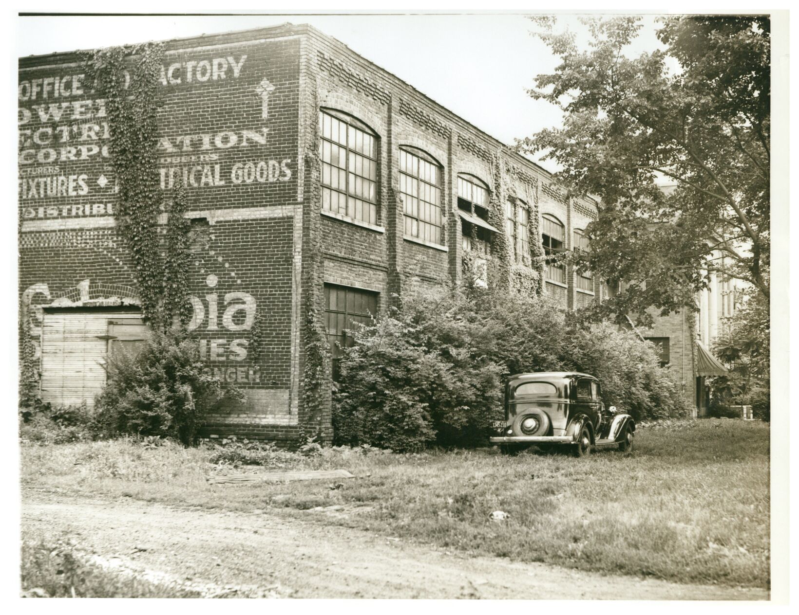 KR.Mailbag.N&T.CaldwellElectricGhostSign.jpg